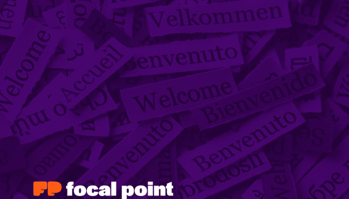 welcome words in different language printed on paper